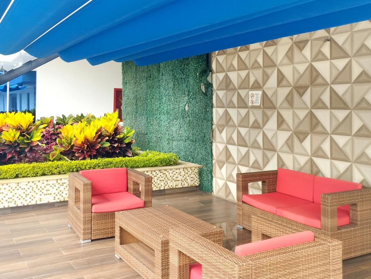 Hotel Royal Elim International Cali Exteriör bild The Sky Lounge