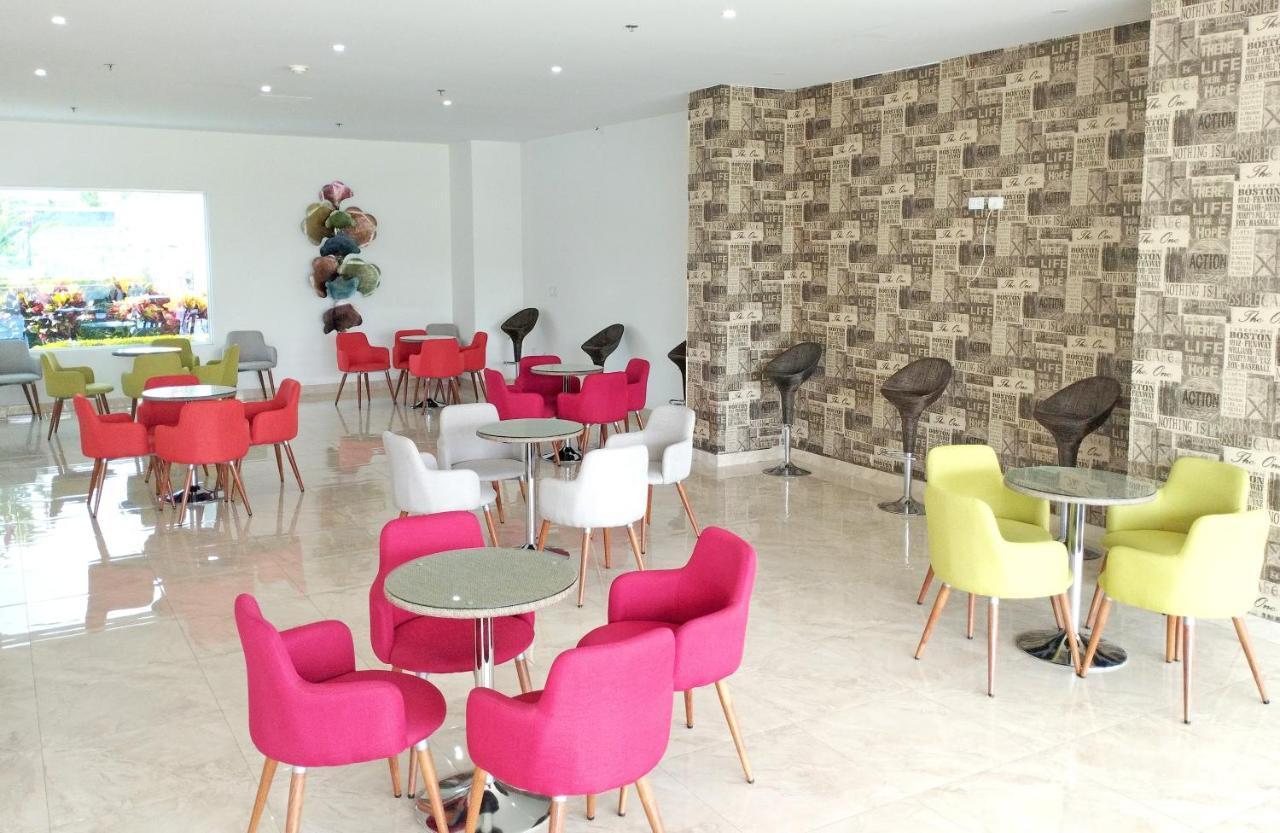 Hotel Royal Elim International Cali Exteriör bild Interior of the new library