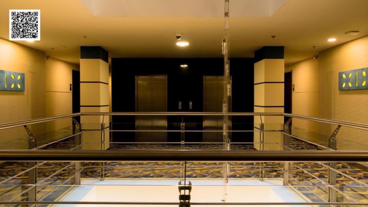Hotel Royal Elim International Cali Exteriör bild The interior of the hotel