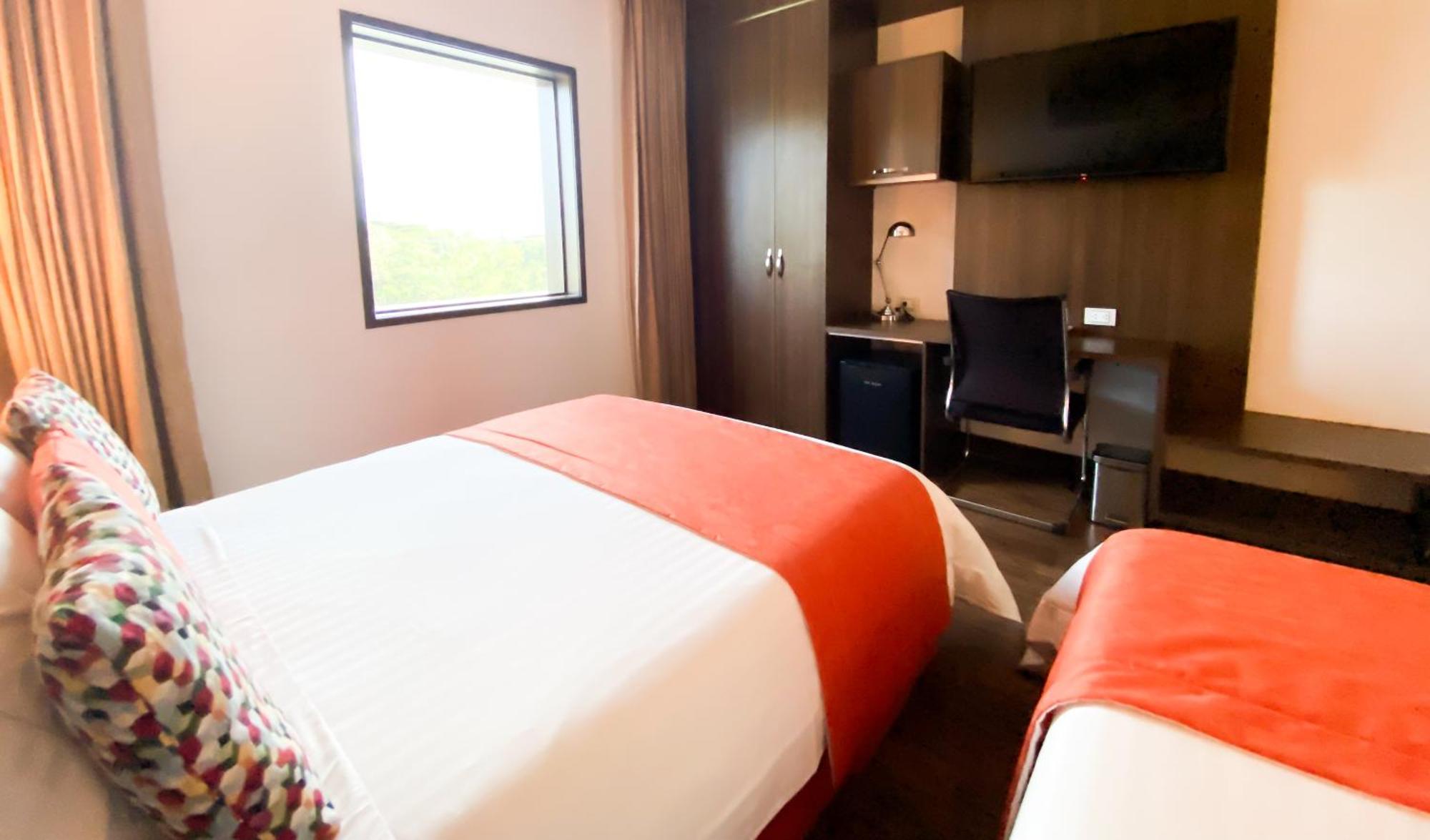 Hotel Royal Elim International Cali Exteriör bild A room at the hotel