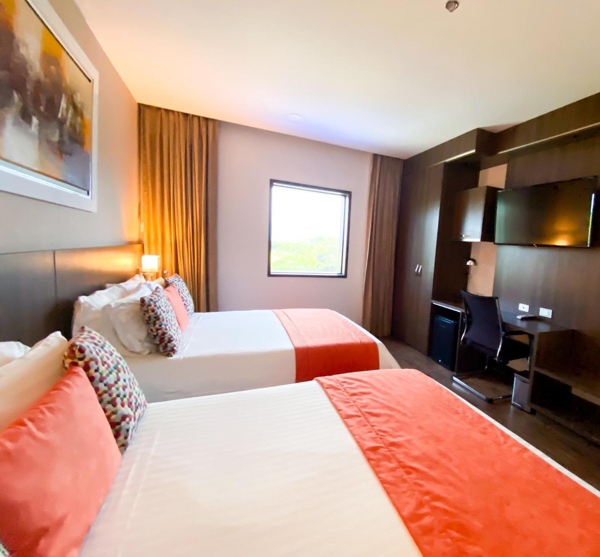 Hotel Royal Elim International Cali Exteriör bild A room at the hotel