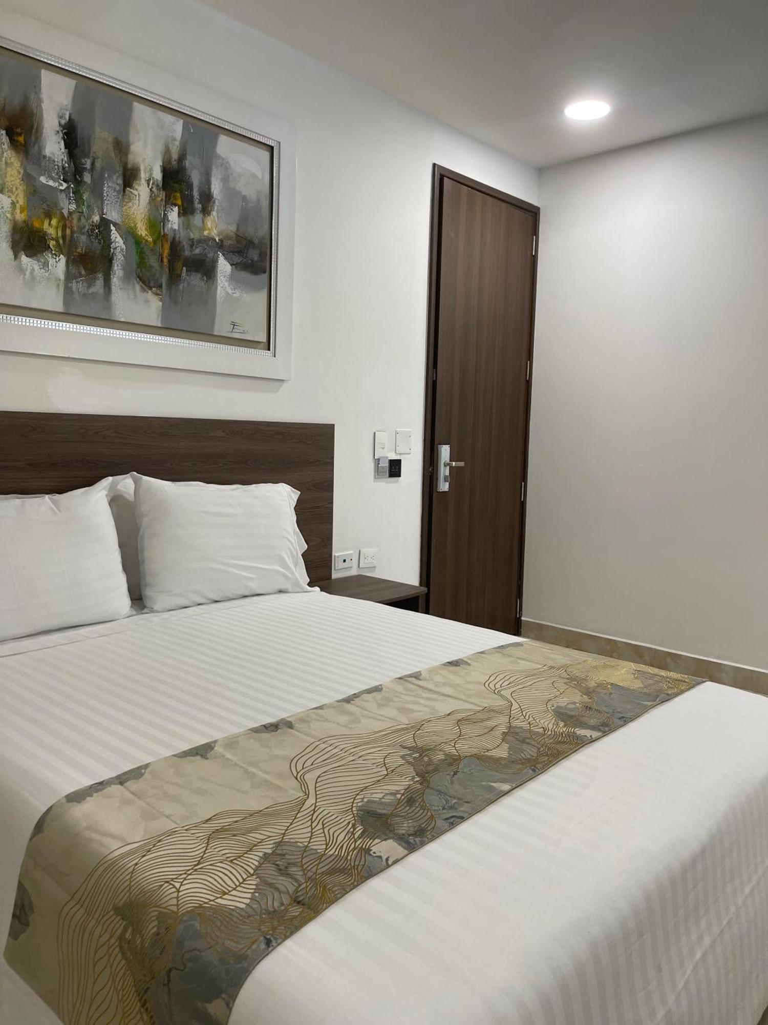Hotel Royal Elim International Cali Exteriör bild A room at the hotel